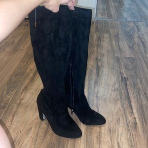 Black suade boots with heel detailing